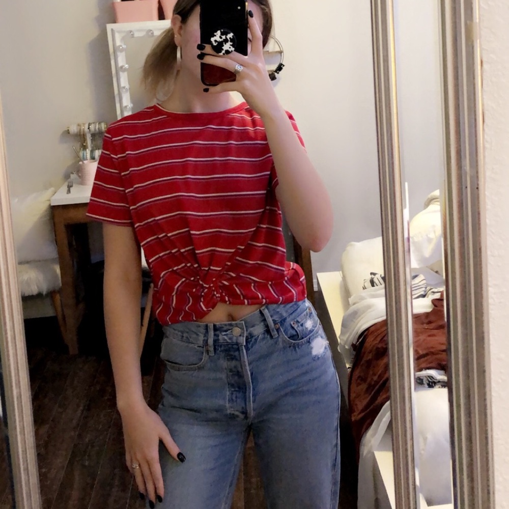 A red top, with stripes and a tie at the bottom!